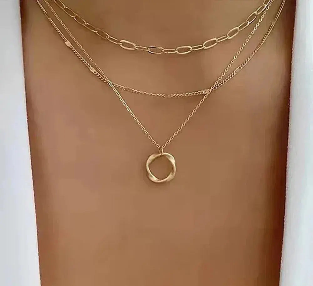 Collier vintage en chaîne dorée et pendentif