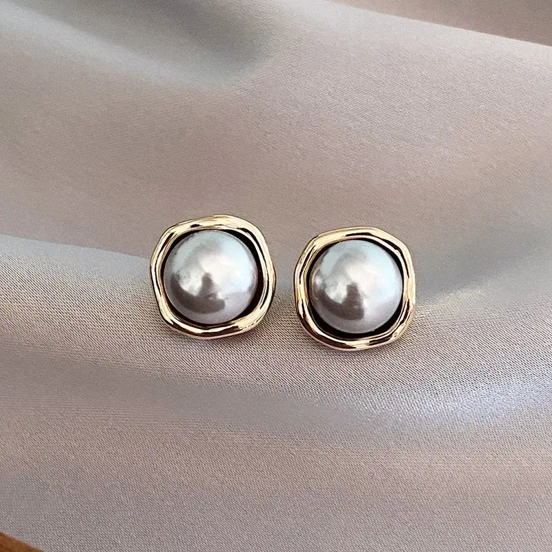 Boucles d'oreilles en perles noires élégantes